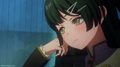 緑髪のキャラクターが物思いにふけるような表情